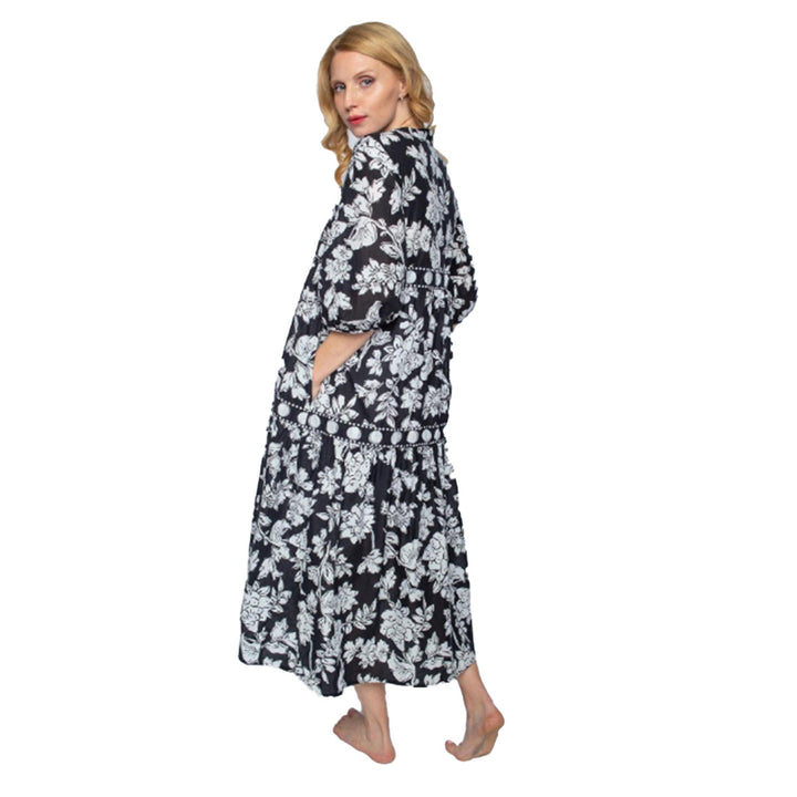 Emily van den Bergh langes Volant-Kleid